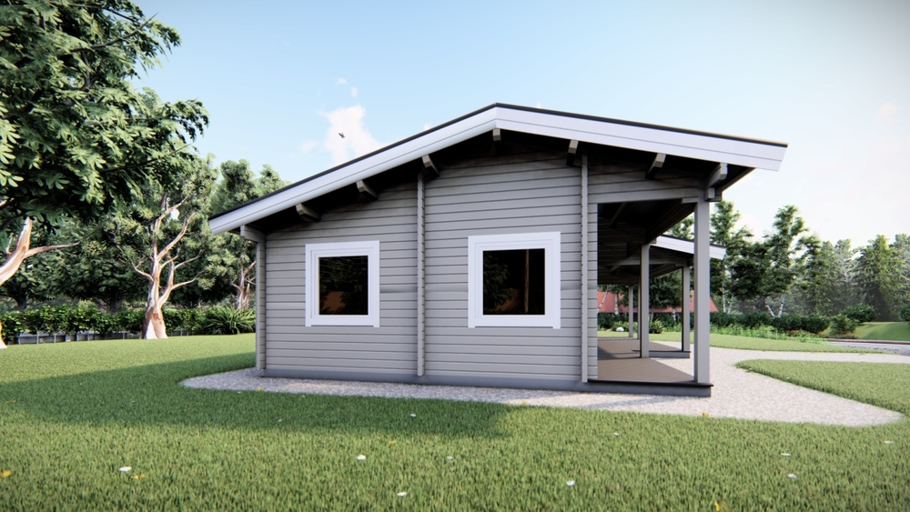 Mały drewniany domek na trawie.