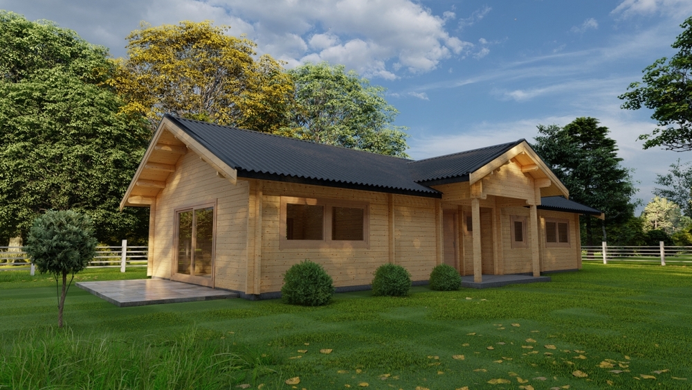 Drewniany dom z dachem szkolnym na zielonej trawie.