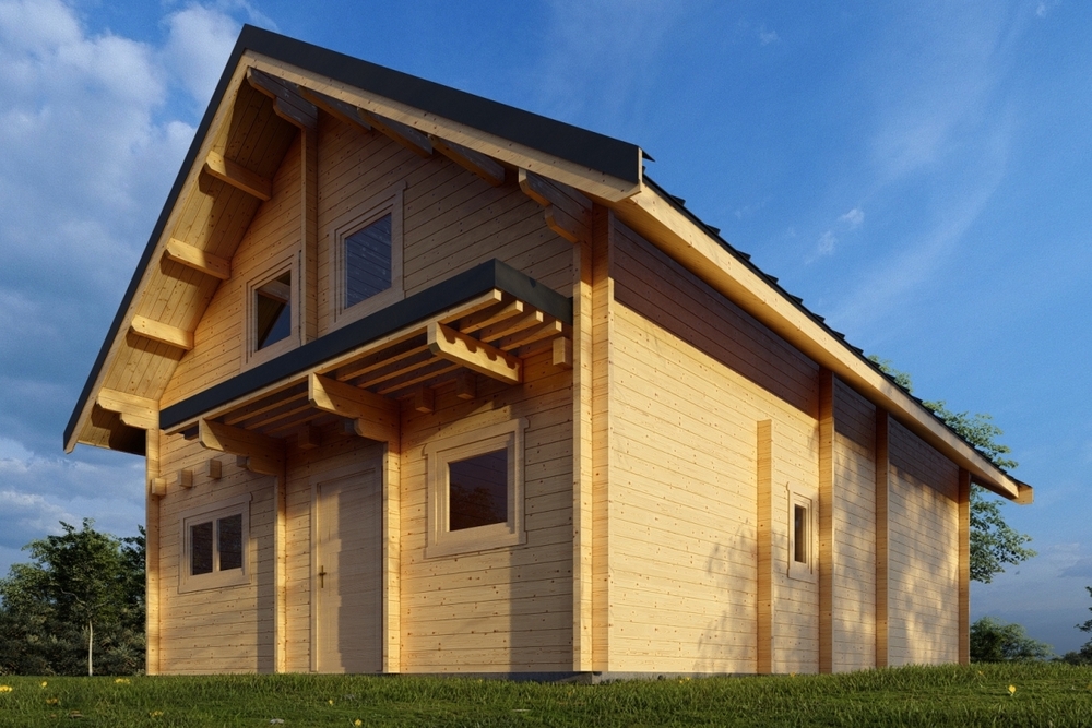 Drewniany dom na zielonym trawniku.