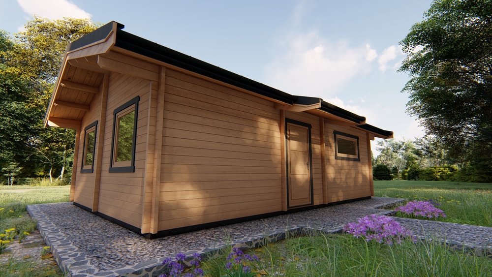 Mały drewniany dom na tle natury.