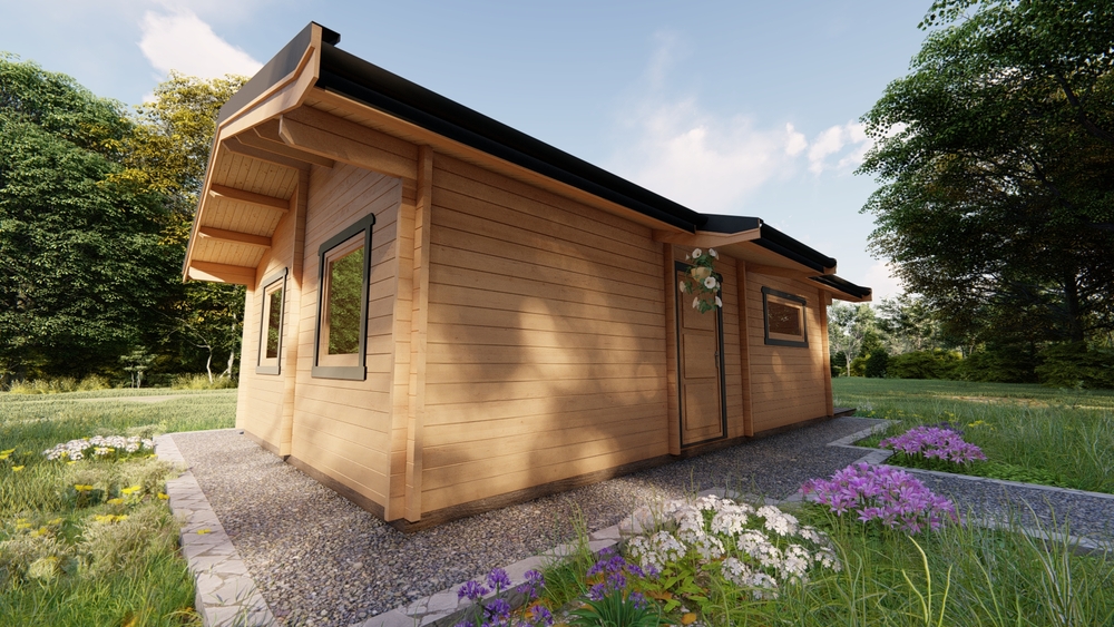 Drewniana chatka na polanie.